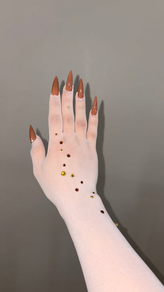 Golden Stones on White Nail Glove